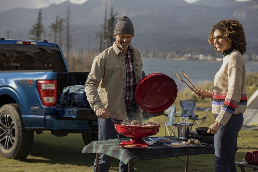 A family tailgates with their Ford F-150. Shop for your new F-150 at Cleveland Ford near Chattanooga today.
