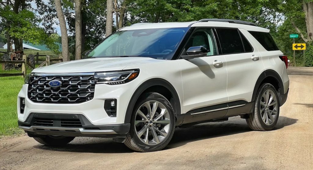 A white new 2025 Ford Explorer sits parked on a dirt road, showcasing its unique style and size. Shop for your new Ford Explorer at Cleveland Ford near Chattanooga.