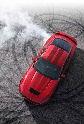 Overhead view of a 2024 Ford Mustang® model with tire tracks on pavement | Cleveland Ford in Cleveland TN